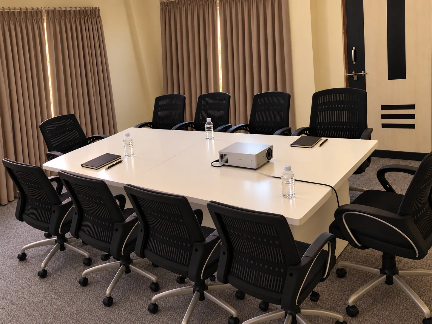Conference room with projector and meeting table